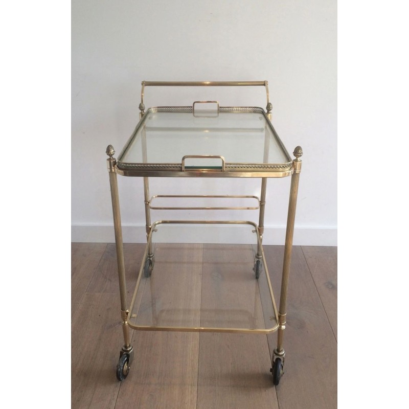 Neoclassical brass drinks trolley by Maison Bagués. Circa 1940