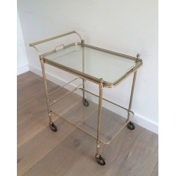 Neoclassical brass drinks trolley by Maison Bagués. Circa 1940