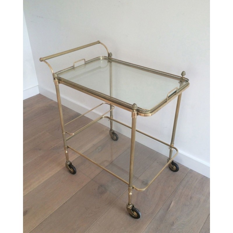 Neoclassical brass drinks trolley by Maison Bagués. Circa 1940
