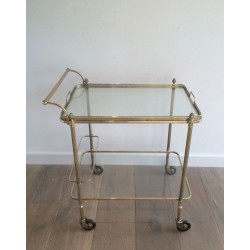 Neoclassical brass drinks trolley by Maison Bagués. Circa 1940