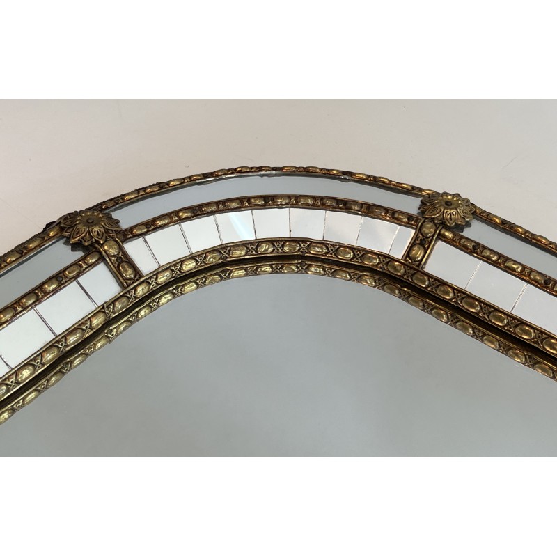 Multi-facets mirror rounded on the corners with brass garlands