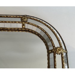 Multi-facets mirror rounded on the corners with brass garlands