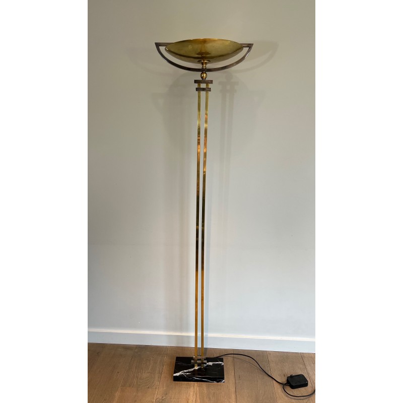 Steel and Brass Floor Lamp, standing on a Black Marble Base. In the Style of Perzel Workshops.