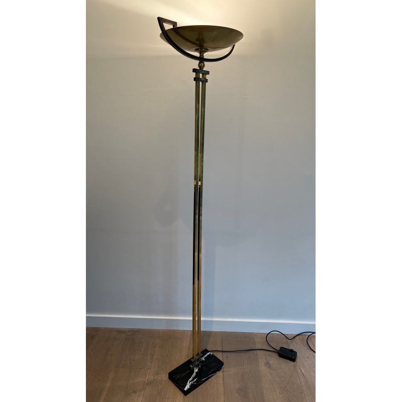 Steel and Brass Floor Lamp, standing on a Black Marble Base. In the Style of Perzel Workshops.