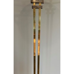 Steel and Brass Floor Lamp, standing on a Black Marble Base. In the Style of Perzel Workshops.