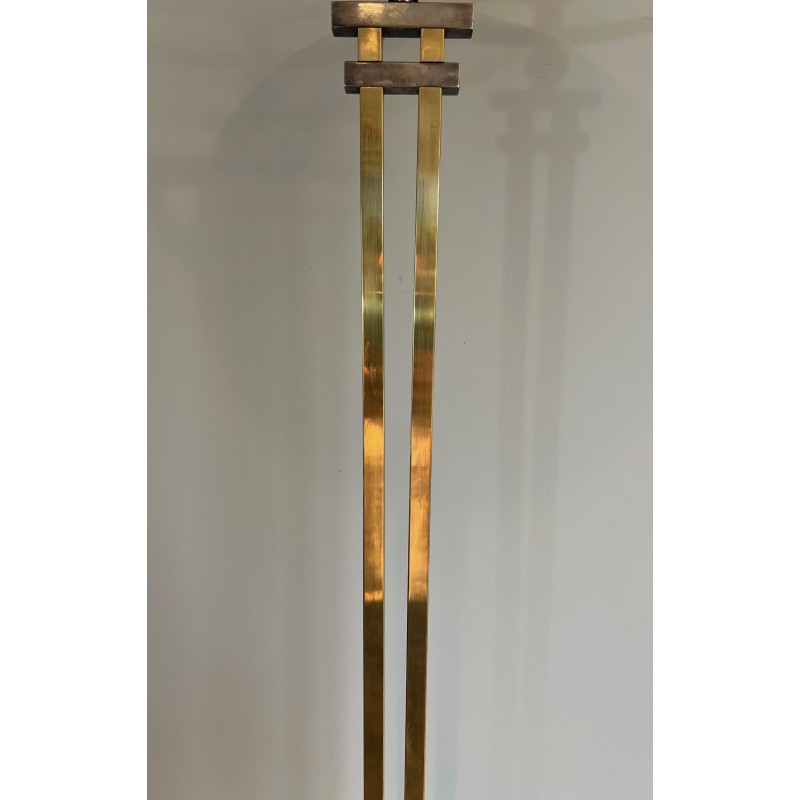 Steel and Brass Floor Lamp, standing on a Black Marble Base. In the Style of Perzel Workshops.