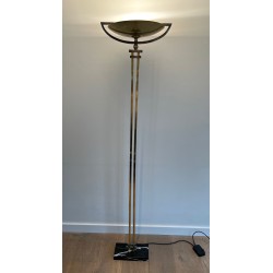 Steel and Brass Floor Lamp, standing on a Black Marble Base. In the Style of Perzel Workshops.