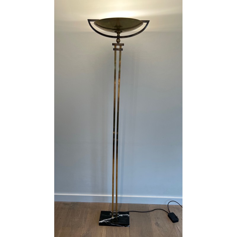 Steel and Brass Floor Lamp, standing on a Black Marble Base. In the Style of Perzel Workshops.