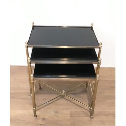 Set of Three Neoclassical Brass Nesting Tables with Black Lacquered Glass Tops by Maison Jansen, Circa 1940