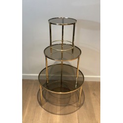 Suite de Trois Tables Gigognes Rondes en Laiton à Plateaux de Verre Fumé, Maison Ramsay, Vers 1940