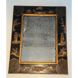 Lacquer and Gilding Mirror with Chinese Scenes in the style of Maison Jansen. Circa 1940