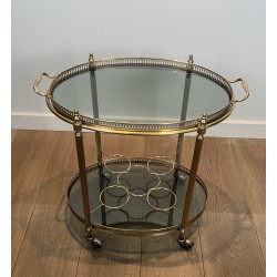 Neoclassical Style Oval Brass Drinks Trolley with Bluish Glass by Maison Jansen