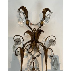 Pair of Gilded Metal and Crystals Wall Sconces in the style of Maison Baguès