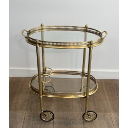 Small Oval Neoclassical Brass Drinks Trolley with Double Removable Tops and Openwork Gallery by Maison Baguès, circa 1940