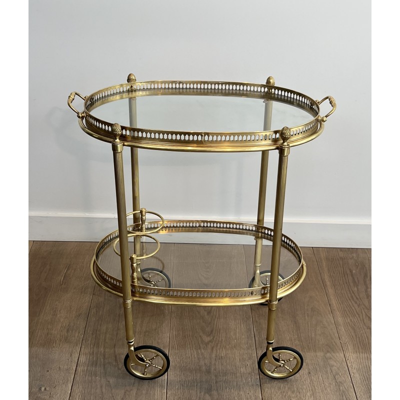 Small Oval Neoclassical Brass Drinks Trolley with Double Removable Tops and Openwork Gallery by Maison Baguès, circa 1940