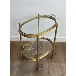 Small Oval Neoclassical Brass Drinks Trolley with Double Removable Tops and Openwork Gallery by Maison Baguès, circa 1940