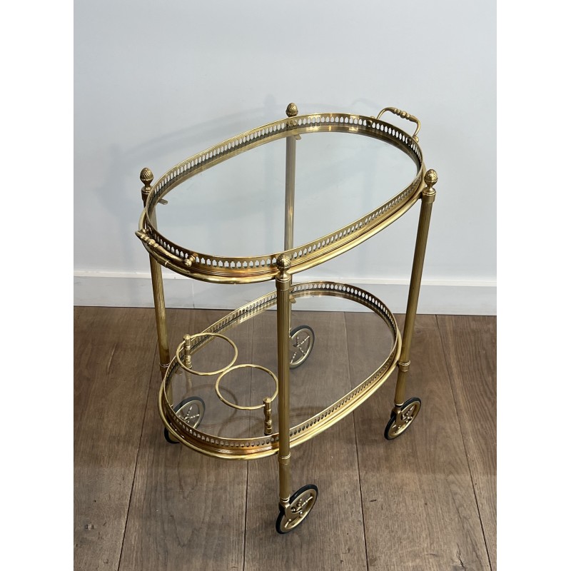 Small Oval Neoclassical Brass Drinks Trolley with Double Removable Tops and Openwork Gallery by Maison Baguès, circa 1940