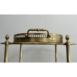 Small Oval Neoclassical Brass Drinks Trolley with Double Removable Tops and Openwork Gallery by Maison Baguès, circa 1940