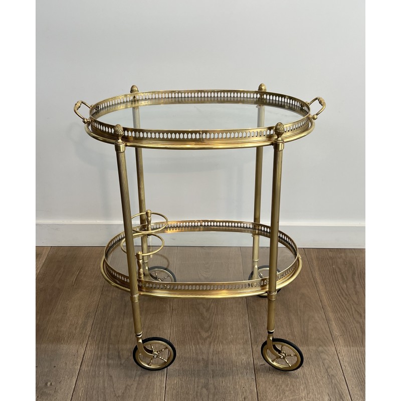 Small Oval Neoclassical Brass Drinks Trolley with Double Removable Tops and Openwork Gallery by Maison Baguès, circa 1940