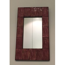 Miroir en céramique rose, travail d'atelier français, vers 1970.