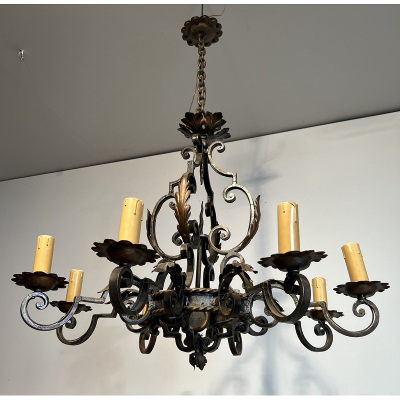 Large 8 lights Wrought Iron Chandelier. Circa 1950