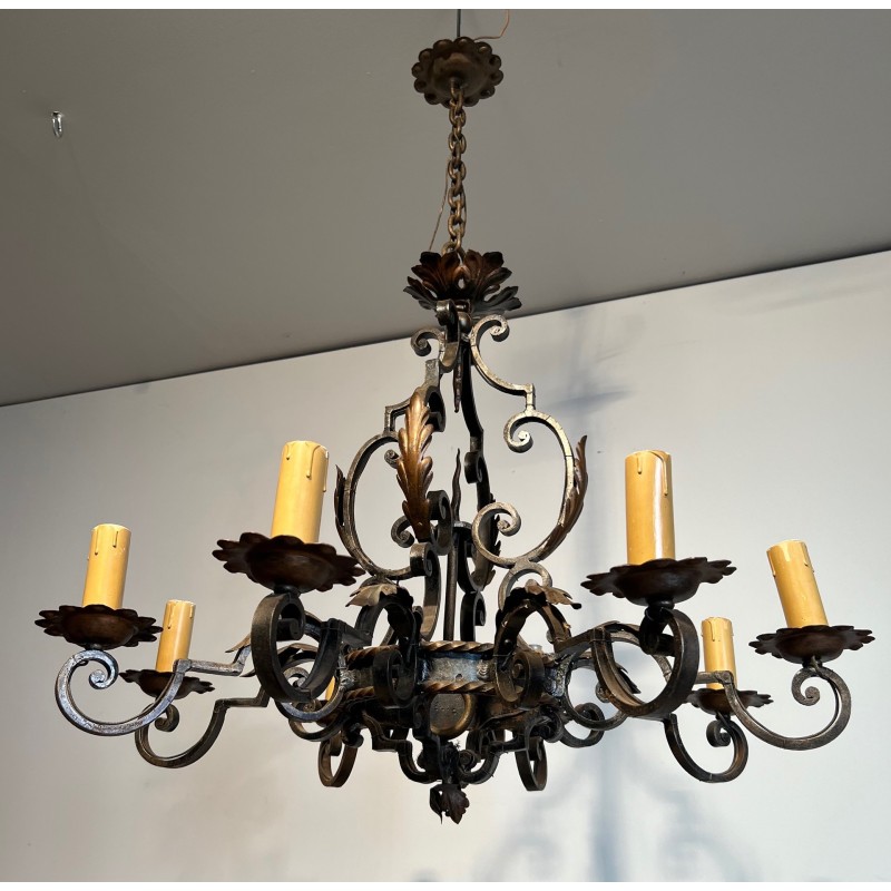 Large 8 lights Wrought Iron Chandelier. Circa 1950