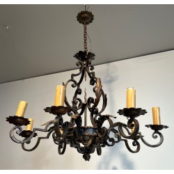 Large 8 lights Wrought Iron Chandelier. Circa 1950