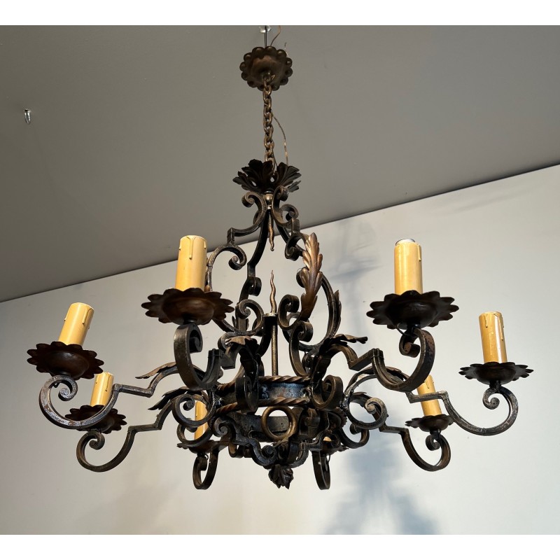 Large 8 lights Wrought Iron Chandelier. Circa 1950