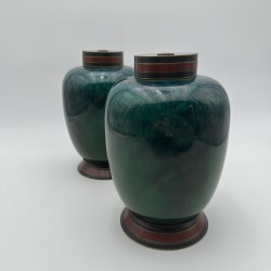 Pair of Sèvres Porcelain Covered Vases with Emerald Glaze, Art Deco Period.
