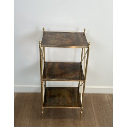 Three-Tier Brass and Eglomise Glass Shelf, Attributed to Maison Jansen, 1940s.
