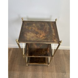 Three-Tier Brass and Eglomise Glass Shelf, Attributed to Maison Jansen, 1940s.