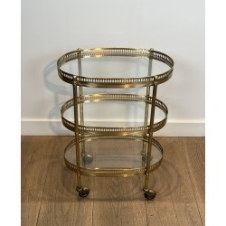 Pair of Oval Brass Bar Carts with Three Tiers and Openwork | Maison Barrois