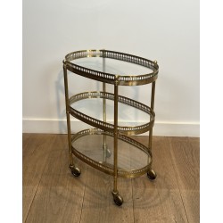 Pair of Oval Brass Bar Carts with Three Tiers and Openwork | Maison Barrois
