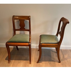 Set of Eight Walnut Chairs with a Bandeau Back and Sabre L | Maison Barrois