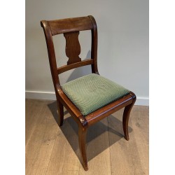 Set of Eight Walnut Chairs with a Bandeau Back and Sabre L | Maison Barrois