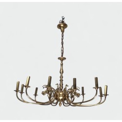 Lustre en Laiton Doré à Douze Bras et Décor de Têtes de Da | Maison Barrois