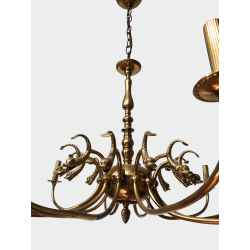 Lustre en Laiton Doré à Douze Bras et Décor de Têtes de Da | Maison Barrois