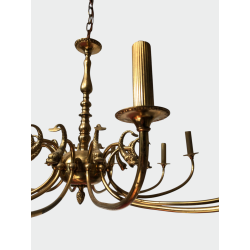 Lustre en Laiton Doré à Douze Bras et Décor de Têtes de Da | Maison Barrois