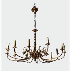 Lustre en Laiton Doré à Douze Bras et Décor de Têtes de Da | Maison Barrois