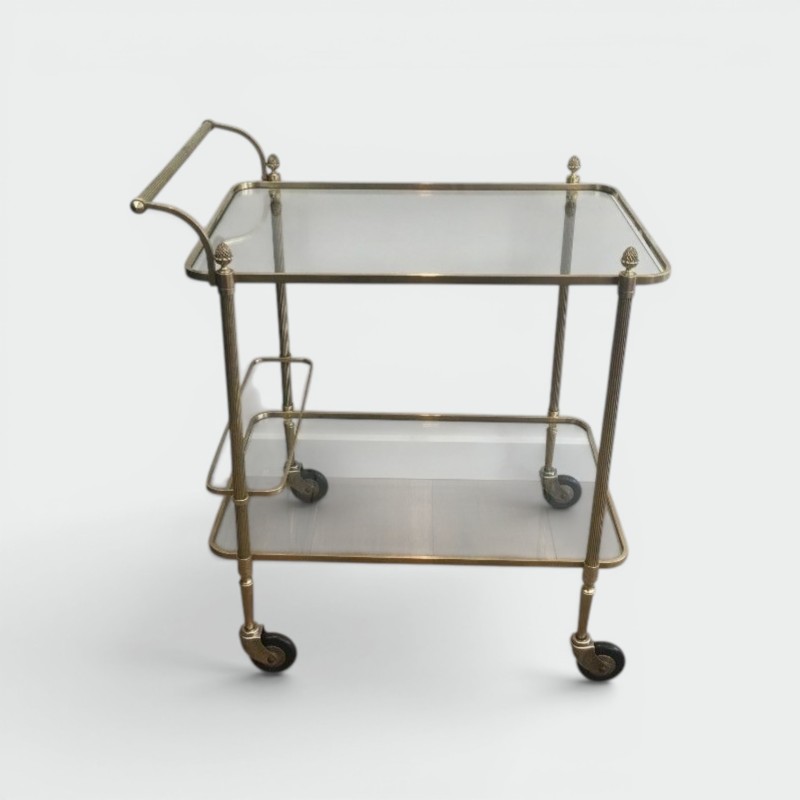 Neoclassical brass drinks trolley by Maison Bagués. Circa 1940