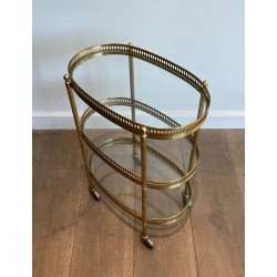 Oval Bar Cart in Gilt Brass with Three Glass Tiers and Ope | Maison Barrois