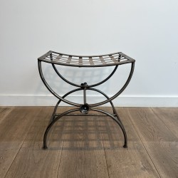Polished Wrought Iron Curule Stool with Woven Seat and Flo | Maison Barrois
