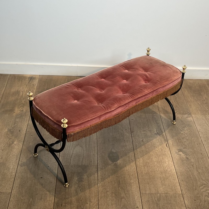 Curule Bench in Black Metal and Brass, Pink / Red Fringed | Maison Barrois