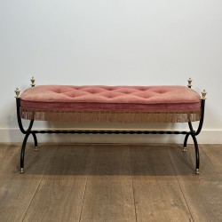 Curule Bench in Black Metal and Brass, Pink / Red Fringed | Maison Barrois