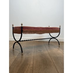 Curule Bench in Black Metal and Brass, Pink / Red Fringed | Maison Barrois