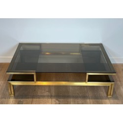 Modernist Brass and Smoked Glass Coffee Table, Guy Lefèvre for Maison Jansen, circa 1970 | Maison BARROIS