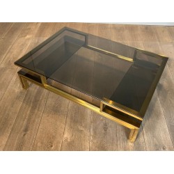 Modernist Brass and Smoked Glass Coffee Table, Guy Lefèvre for Maison Jansen, circa 1970 | Maison BARROIS
