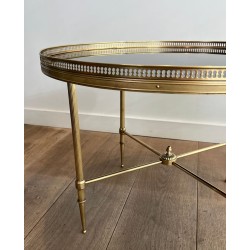 Art Déco Round Brass Coffee Table, Black Glass Top, Maison Jansen, circa 1940 | Maison BARROIS