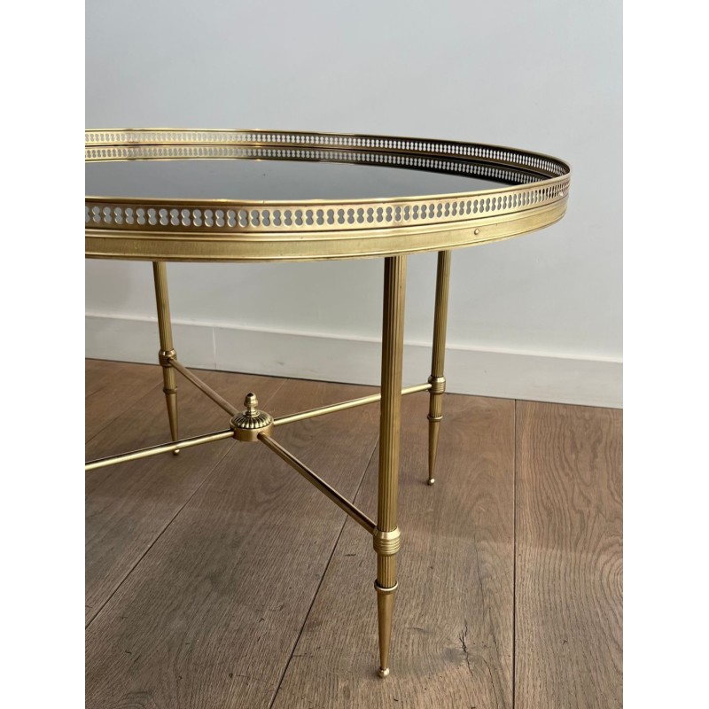 Art Déco Round Brass Coffee Table, Black Glass Top, Maison Jansen, circa 1940 | Maison BARROIS