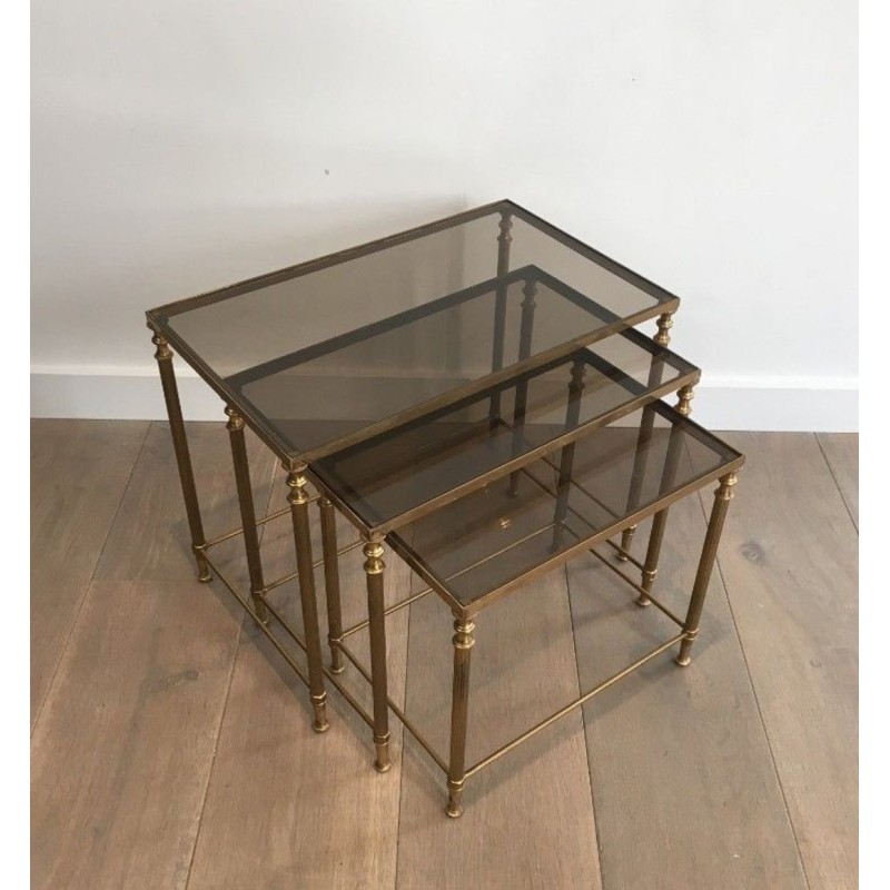 Set of Three Neoclassical Gilt Brass & Smoked Glass Nesting Tables, France circa 1940